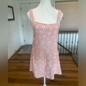 NWOT SO Orange and White Checker Flower Romper Small